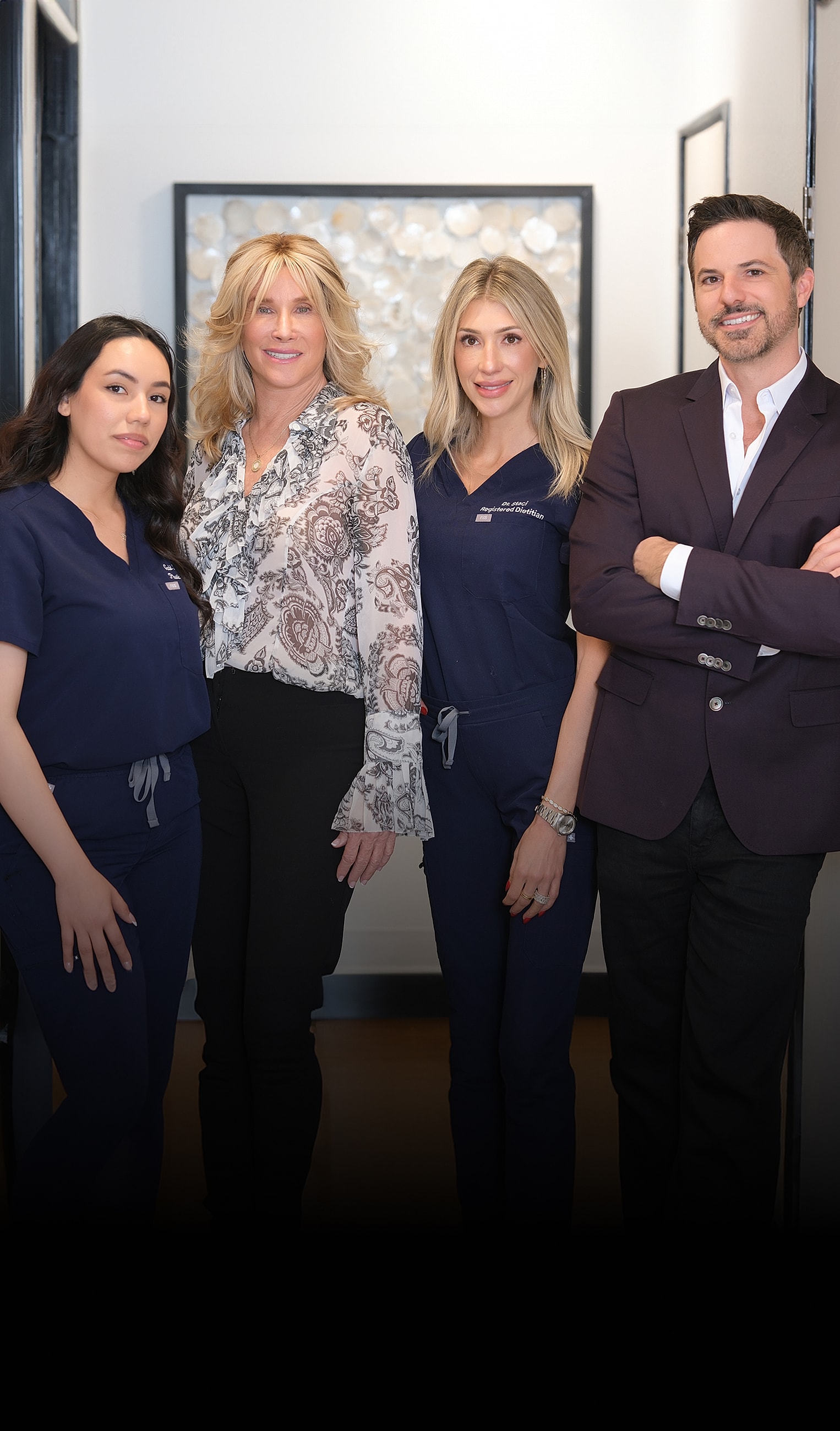 Medical professionals posing for a group photo.